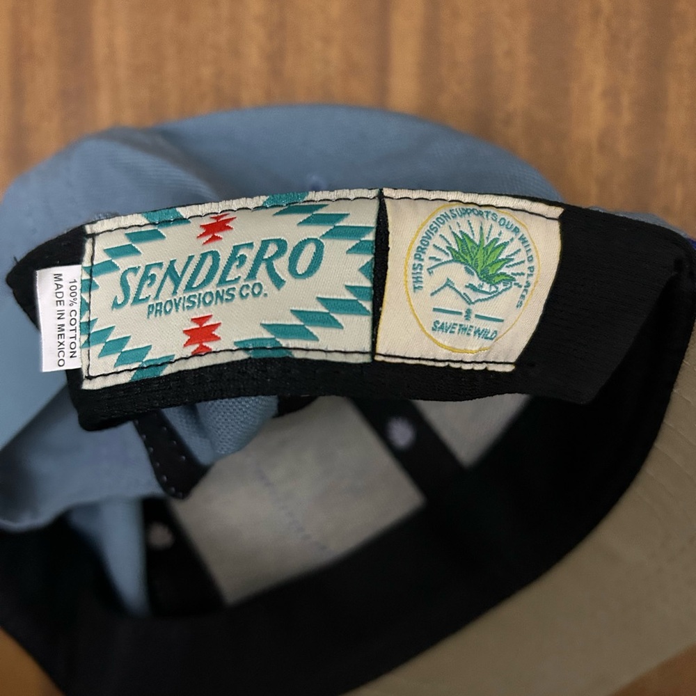 Guadalupe Range trucker hat blue and tan